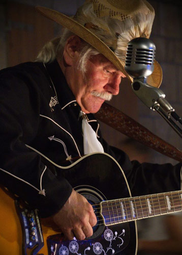 Fernand playng his SJ-200 Gibson Guitar